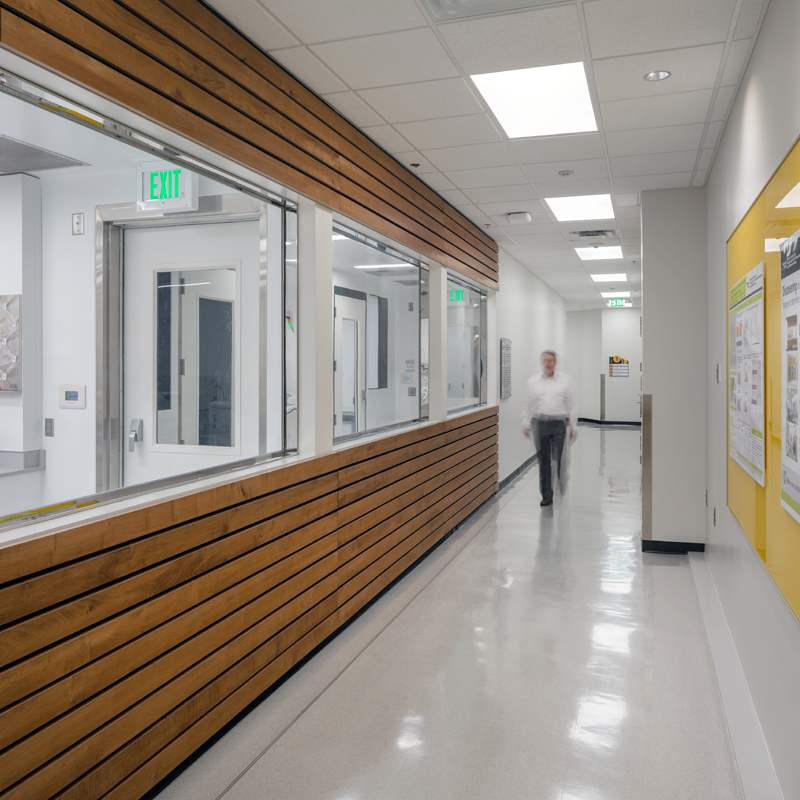 man walking in hallway